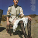 Image for article titled Marie Claire's "Outlaw" Look: $13,000 Gown & Black Lipstick